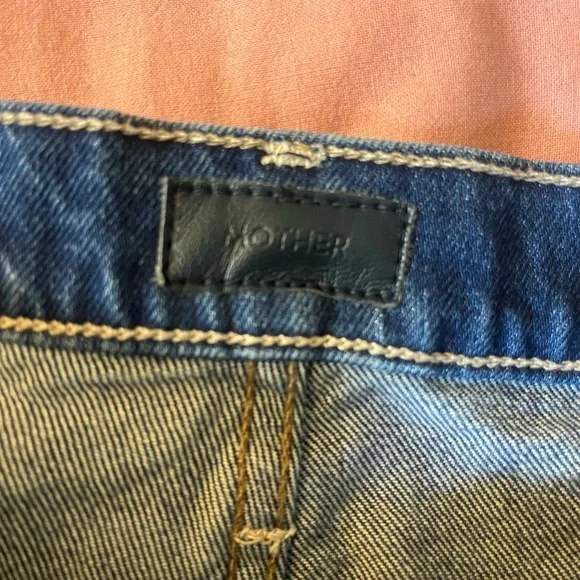 MOTHER Blue Jean Shorts with Distressed Hem and Graphic Text